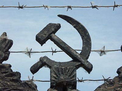Hammer and sickle, barbed wire.